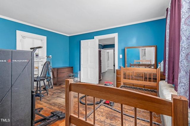 940 Hill St, Rocky Mount, NC 27801 - bedroom with crown molding and wood finished floors