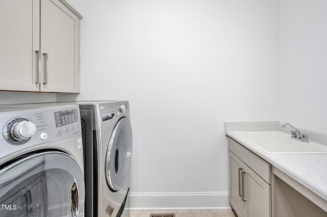 6250 Moinear Ln, Chapel Hill, NC 27514 - laundry room with separate washer and dryer, cabinet space, and baseboards