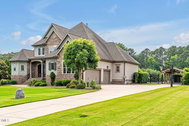 6250 Moinear Ln, Chapel Hill, NC 27514 - craftsman house featuring stone siding, a garage, driveway, and a gazebo