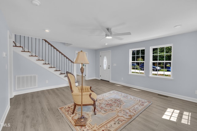 305 W Canary St, Dunn, NC 28334 - entrance foyer with stairs, ceiling fan, wood finished floors, baseboards, and recessed lighting