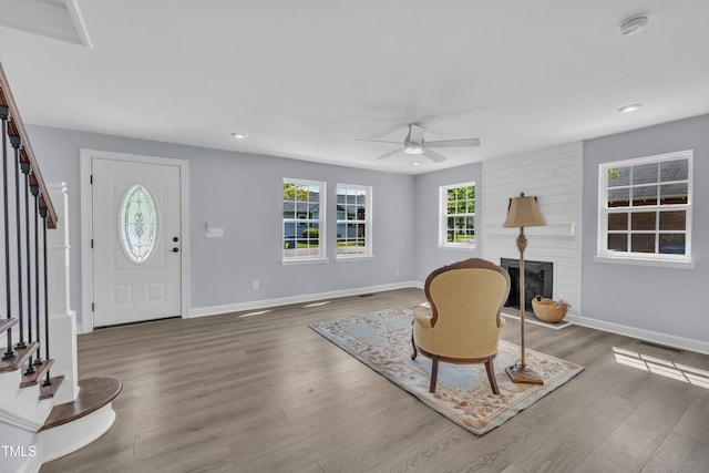 305 W Canary St, Dunn, NC 28334 - entryway featuring ceiling fan, a fireplace, baseboards, recessed lighting, and wood finished floors