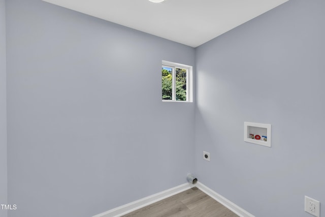 305 W Canary St, Dunn, NC 28334 - washroom featuring hookup for an electric dryer, washer hookup, wood finished floors, and baseboards