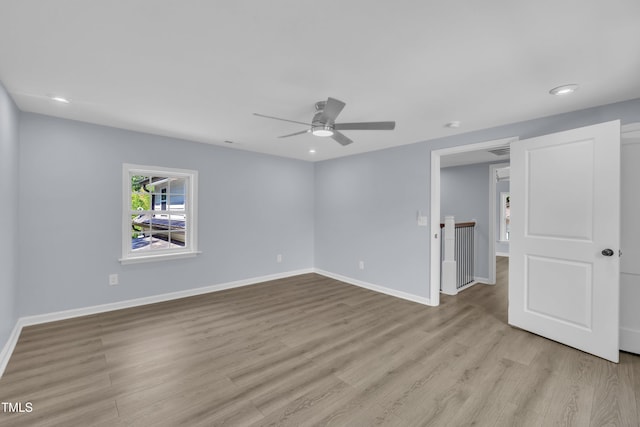 305 W Canary St, Dunn, NC 28334 - spare room with wood finished floors, a ceiling fan, baseboards, and recessed lighting