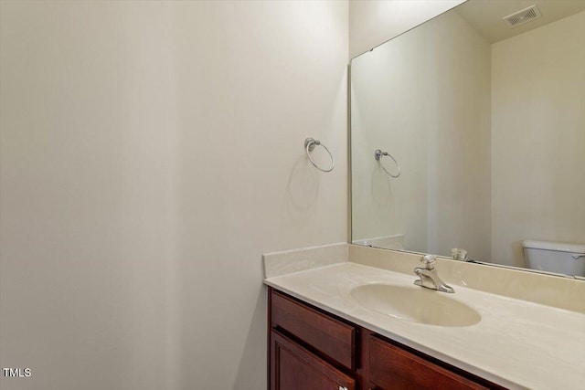 229 Michigan Ave, Cary, NC 27519 - half bathroom featuring vanity and toilet
