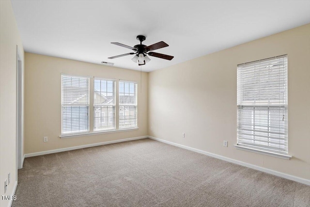 229 Michigan Ave, Cary, NC 27519 - unfurnished room with carpet flooring, a ceiling fan, and baseboards