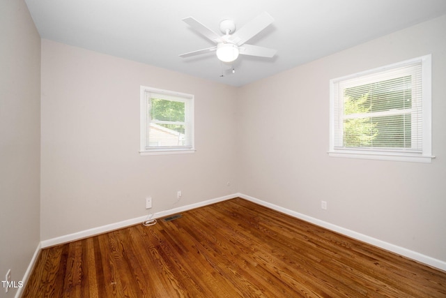 202 Crest Rd, Cary, NC 27513 - spare room with baseboards, wood finished floors, and a ceiling fan