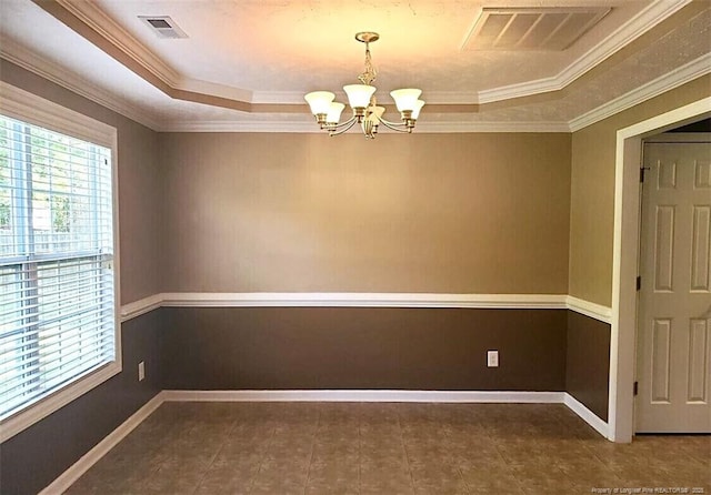 1824 Ponderosa Trl, Cameron, NC 28326 - spare room featuring a chandelier, a tray ceiling, ornamental molding, tile patterned floors, and baseboards