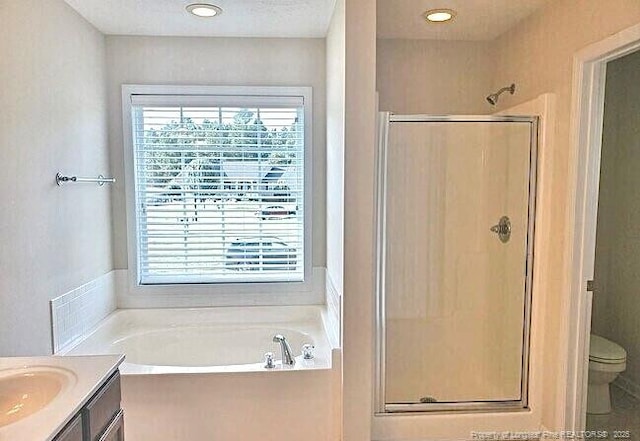 1824 Ponderosa Trl, Cameron, NC 28326 - full bathroom with a stall shower, a bath, toilet, and vanity