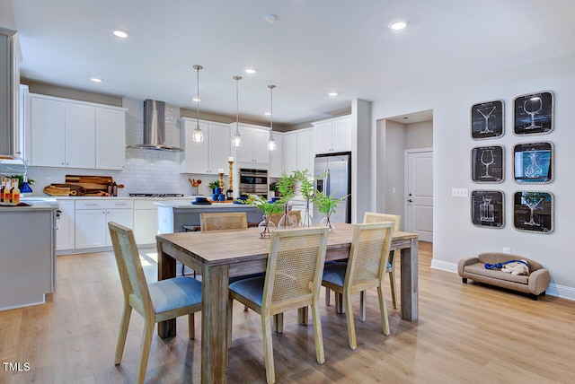 2512 Stonington Dr, Cary, NC 27523 - dining area featuring light wood-style floors, recessed lighting, and baseboards