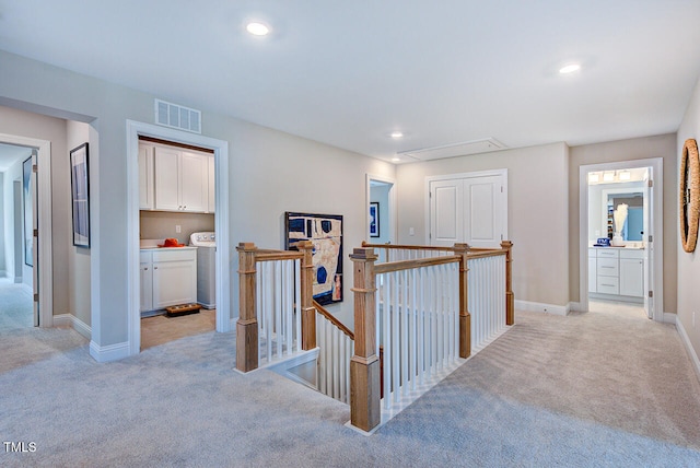 2512 Stonington Dr, Cary, NC 27523 - corridor featuring an upstairs landing, attic access, light colored carpet, baseboards, and recessed lighting