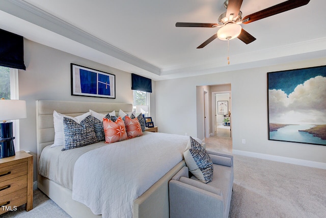 2512 Stonington Dr, Cary, NC 27523 - bedroom with carpet floors, a raised ceiling, ceiling fan, baseboards, and crown molding