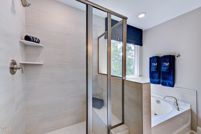 2512 Stonington Dr, Cary, NC 27523 - bathroom with a shower stall and a bath