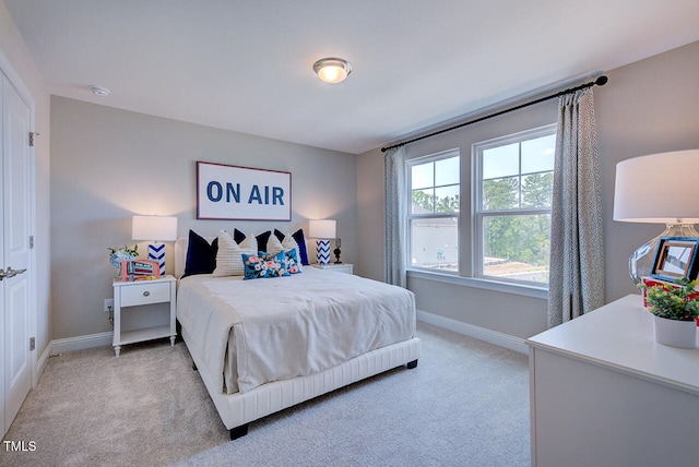 2512 Stonington Dr, Cary, NC 27523 - bedroom featuring light colored carpet and baseboards