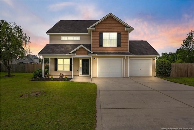 153 Abbey Ln, Raeford, NC 28376 - traditional-style home with driveway and an attached garage