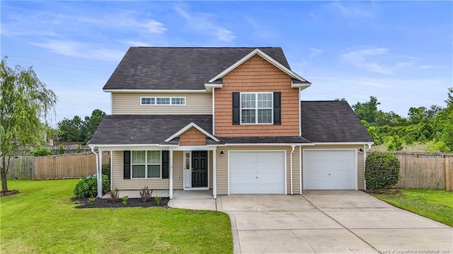 153 Abbey Ln, Raeford, NC 28376 - view of front of property featuring driveway, covered porch, and a shingled roof