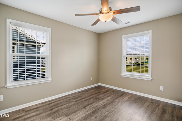 5910 Giddings St, Raleigh, NC 27616 - spare room featuring plenty of natural light, wood finished floors, and baseboards