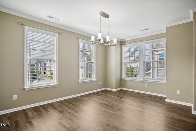 5910 Giddings St, Raleigh, NC 27616 - unfurnished room with a chandelier, dark wood finished floors, crown molding, and baseboards