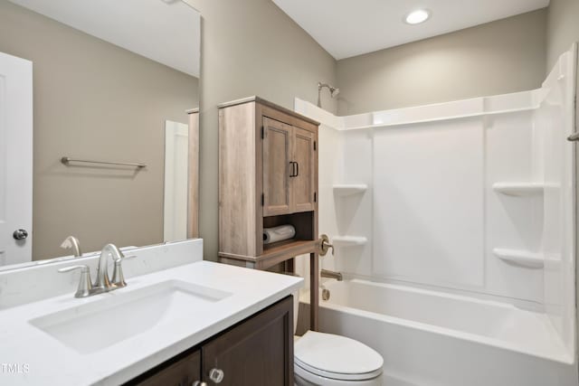 5910 Giddings St, Raleigh, NC 27616 - bathroom featuring vanity, shower / bathtub combination, and toilet