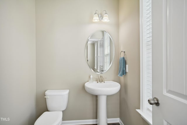 5910 Giddings St, Raleigh, NC 27616 - half bathroom with toilet and baseboards