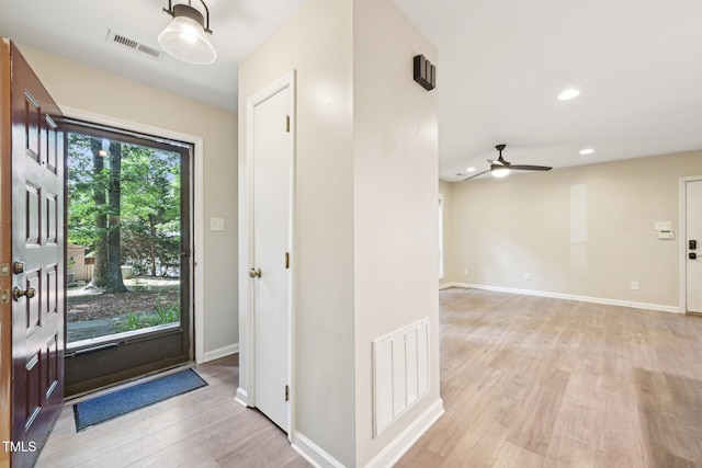 124 Twin Oaks Pl, Cary, NC 27511 - entryway featuring light wood-style flooring, baseboards, ceiling fan, and recessed lighting