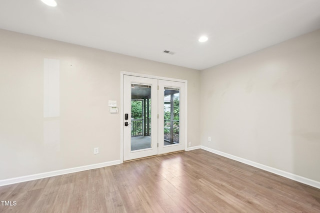 124 Twin Oaks Pl, Cary, NC 27511 - empty room with baseboards, wood finished floors, and recessed lighting