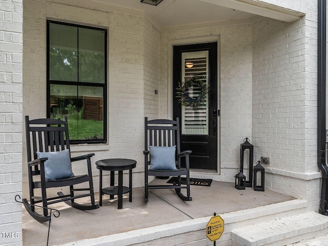 1610 Draper View Loop Unit 101, Raleigh, NC 27608 - view of exterior entry featuring brick siding