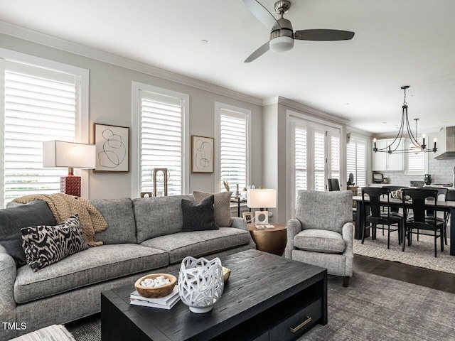 1610 Draper View Loop Unit 101, Raleigh, NC 27608 - living area with a ceiling fan, dark wood-style flooring, a chandelier, and crown molding