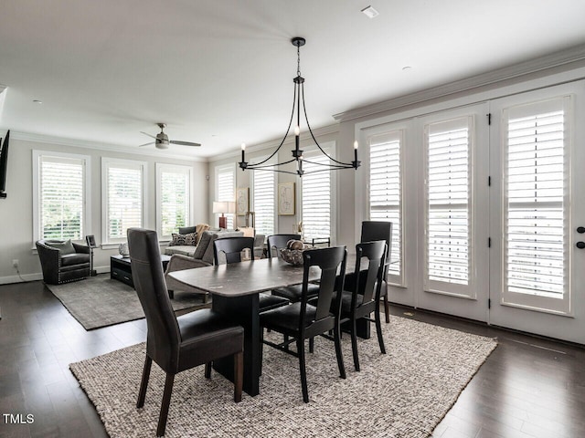 1610 Draper View Loop Unit 101, Raleigh, NC 27608 - dining space featuring crown molding, a chandelier, wood finished floors, and a ceiling fan