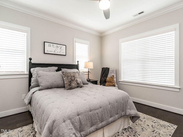 1610 Draper View Loop Unit 101, Raleigh, NC 27608 - bedroom featuring crown molding, dark wood finished floors, and a ceiling fan