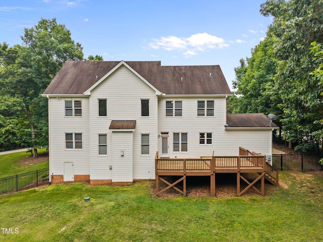 1124 Kalworth Rd, Wake Forest, NC 27587 - back of house with a fenced backyard, a deck, and a shingled roof