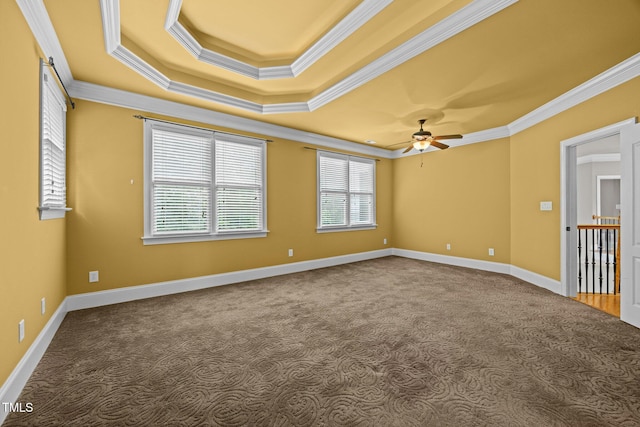 1124 Kalworth Rd, Wake Forest, NC 27587 - carpeted empty room with a tray ceiling, crown molding, and a ceiling fan