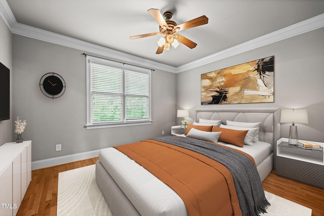 1124 Kalworth Rd, Wake Forest, NC 27587 - bedroom with ornamental molding, wood finished floors, and a ceiling fan