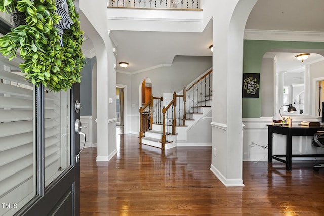 5516 Colonial Oaks Dr, Apex, NC 27539 - entrance foyer with crown molding, wood finished floors, and stairway