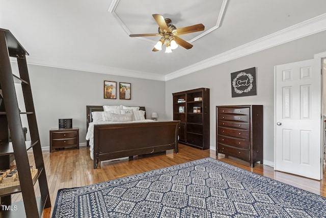5516 Colonial Oaks Dr, Apex, NC 27539 - bedroom featuring crown molding, wood finished floors, baseboards, and ceiling fan