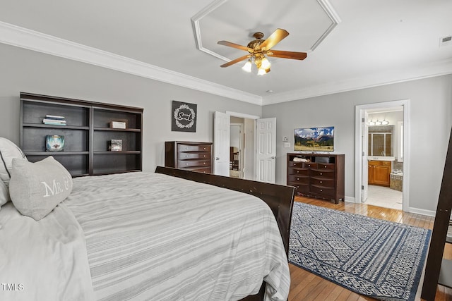 5516 Colonial Oaks Dr, Apex, NC 27539 - bedroom featuring light wood finished floors, crown molding, ceiling fan, baseboards, and ensuite bath