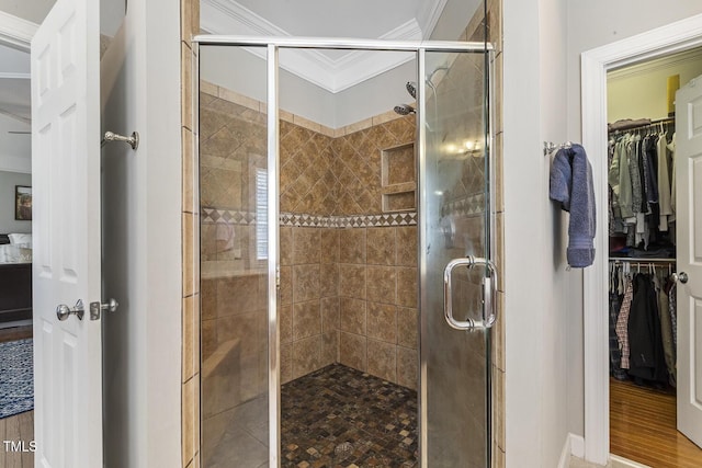 5516 Colonial Oaks Dr, Apex, NC 27539 - full bath with crown molding, a shower stall, and a walk in closet