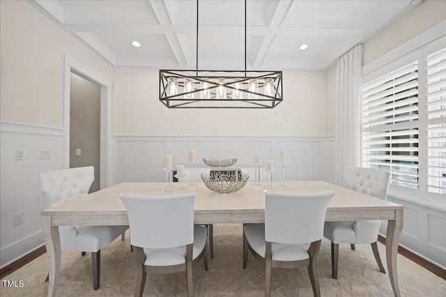 111 Stone Park Dr, Wake Forest, NC 27587 - dining room with a decorative wall, coffered ceiling, wood finished floors, a chandelier, and beam ceiling