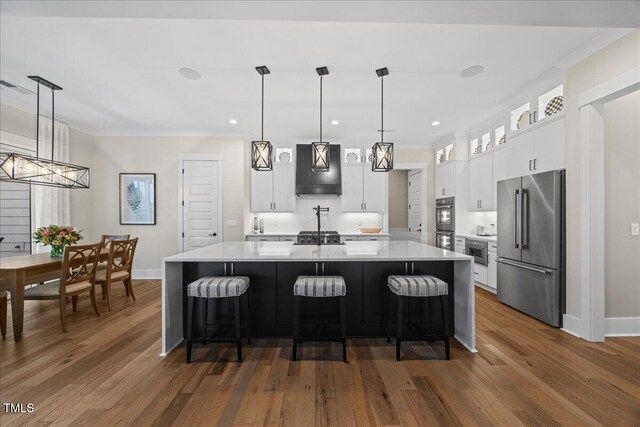 111 Stone Park Dr, Wake Forest, NC 27587 - kitchen featuring high end fridge, premium range hood, light countertops, dark wood-style floors, and crown molding