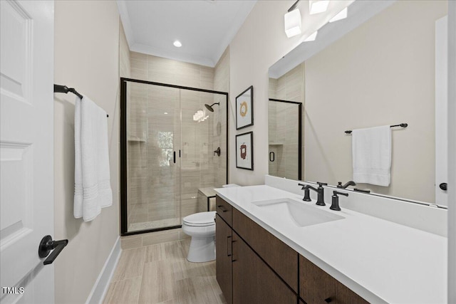 111 Stone Park Dr, Wake Forest, NC 27587 - full bath featuring toilet, vanity, a stall shower, baseboards, and recessed lighting