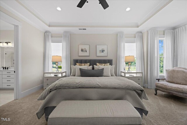 111 Stone Park Dr, Wake Forest, NC 27587 - bedroom with multiple windows, baseboards, a tray ceiling, light colored carpet, and recessed lighting