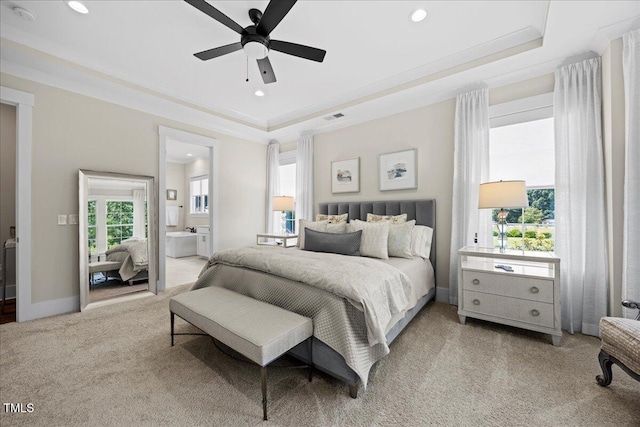111 Stone Park Dr, Wake Forest, NC 27587 - bedroom featuring light carpet, a tray ceiling, recessed lighting, baseboards, and ensuite bathroom