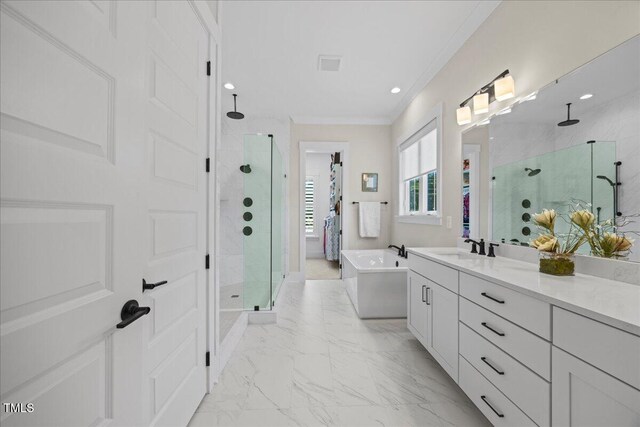 111 Stone Park Dr, Wake Forest, NC 27587 - full bath with a stall shower, vanity, a freestanding bath, ornamental molding, and marble finish flooring