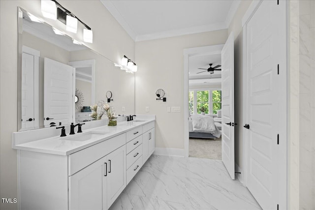 111 Stone Park Dr, Wake Forest, NC 27587 - ensuite bathroom with double vanity, marble look tiles, baseboards, ceiling fan, and crown molding