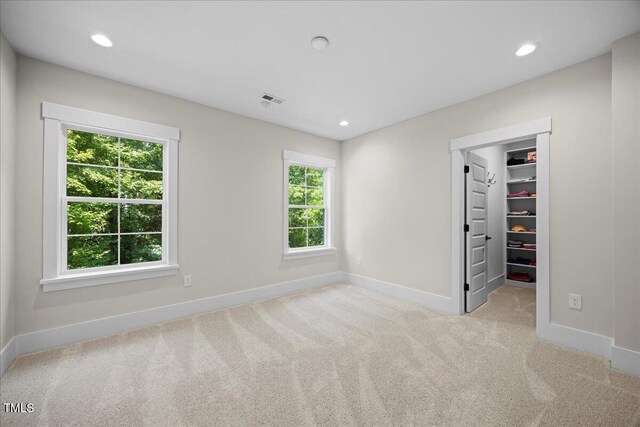 111 Stone Park Dr, Wake Forest, NC 27587 - unfurnished bedroom featuring a spacious closet, baseboards, carpet, recessed lighting, and a closet