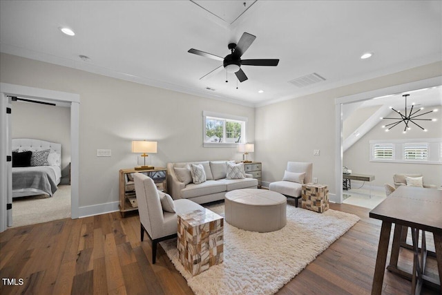 111 Stone Park Dr, Wake Forest, NC 27587 - living room with wood finished floors, recessed lighting, a chandelier, plenty of natural light, and ornamental molding