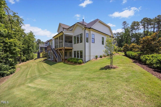 111 Stone Park Dr, Wake Forest, NC 27587 - rear view of house featuring a sunroom, stairs, a yard, and a ceiling fan