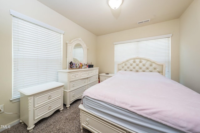 1017 Frank Page Dr, Cary, NC 27511 - bedroom featuring dark carpet and baseboards