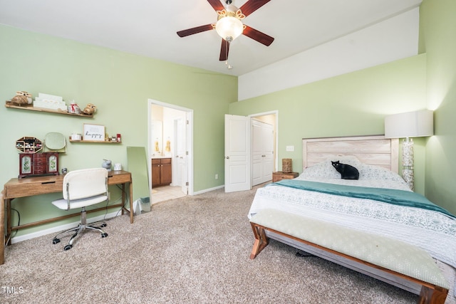 1017 Frank Page Dr, Cary, NC 27511 - bedroom featuring carpet flooring, connected bathroom, lofted ceiling, ceiling fan, and baseboards