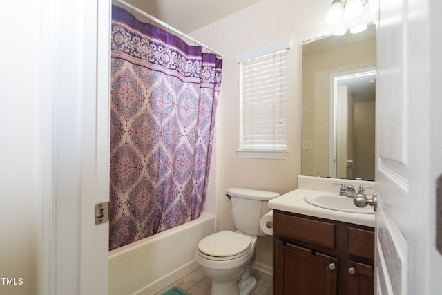 1017 Frank Page Dr, Cary, NC 27511 - bathroom featuring vanity, toilet, shower / bath combo with shower curtain, and tile patterned floors