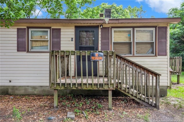 6200 Arabia Rd, Lumber Bridge, NC 28357 - view of front of house with a deck